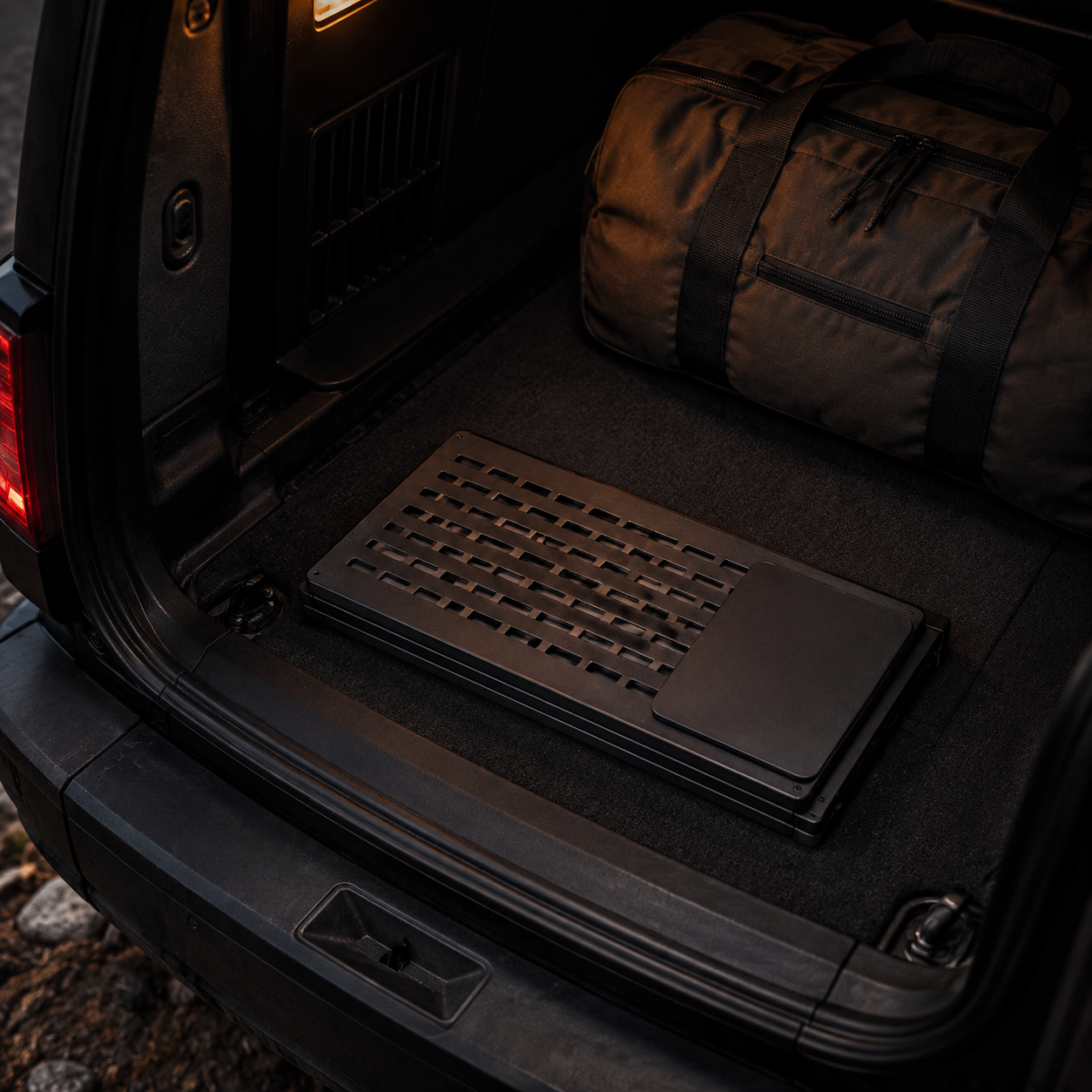ROVOLT MAGDECK folded flat in an SUV cargo area